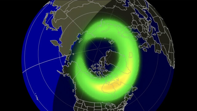 Map showing forecast location and intensity of aurora borealis around the north pole.
