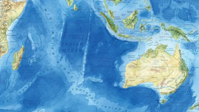 Crop of painted map showing Australia and Indonesia.